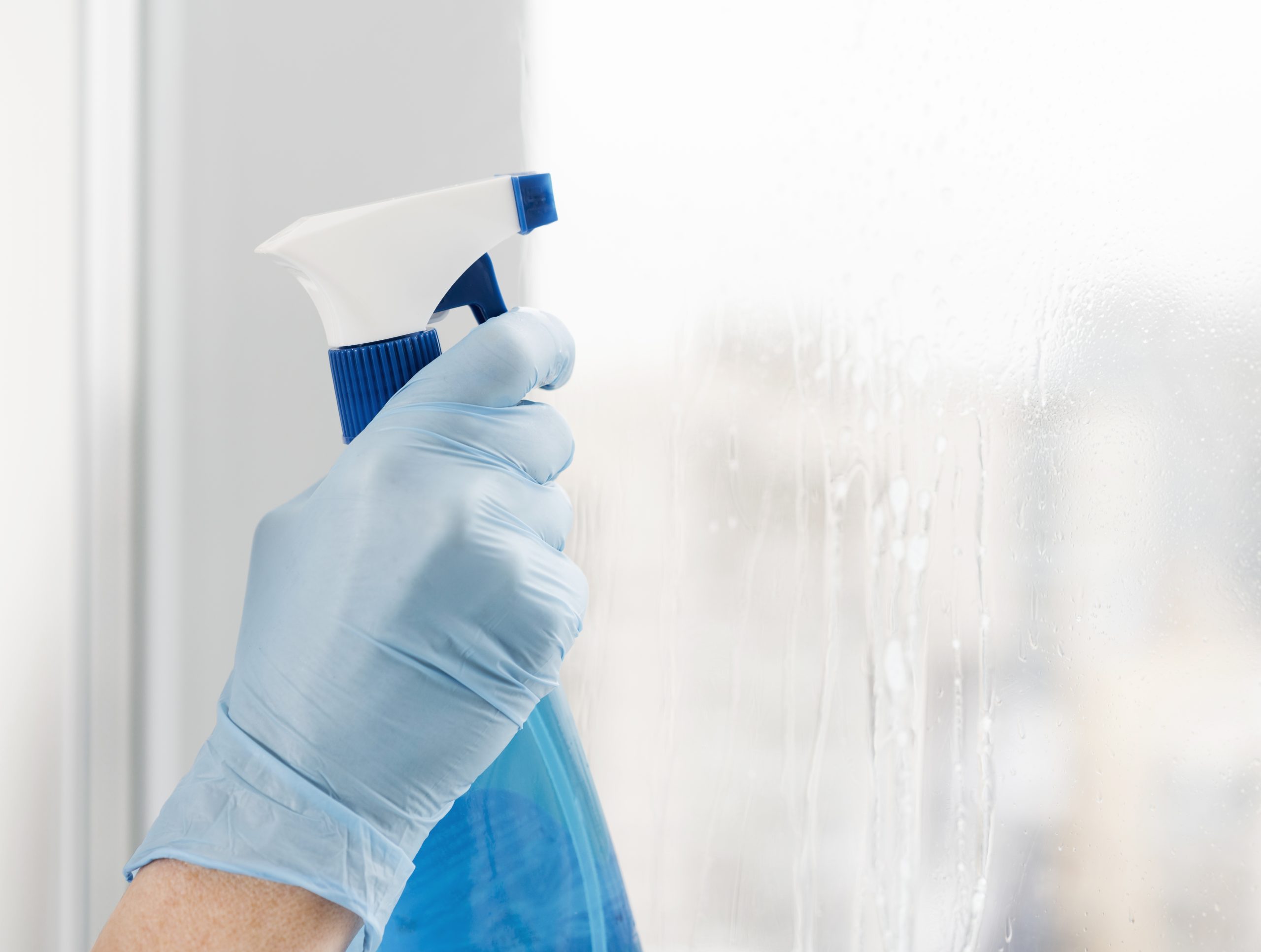 woman-cleaning-window